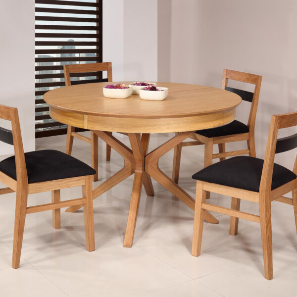 Table ronde Contemporaine Romain, diamètre 120 cm réalisée en chêne avec un pieds central et 1 allonge portefeuille de 50 cm